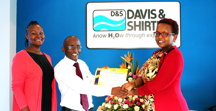 Rotary Club of Nairobi Industrial Area representative Saum Siraj presenting a certificate of appreciation to Davis & Shirtliff Finance director George Mbugua and Marketing Manager Jos Musima