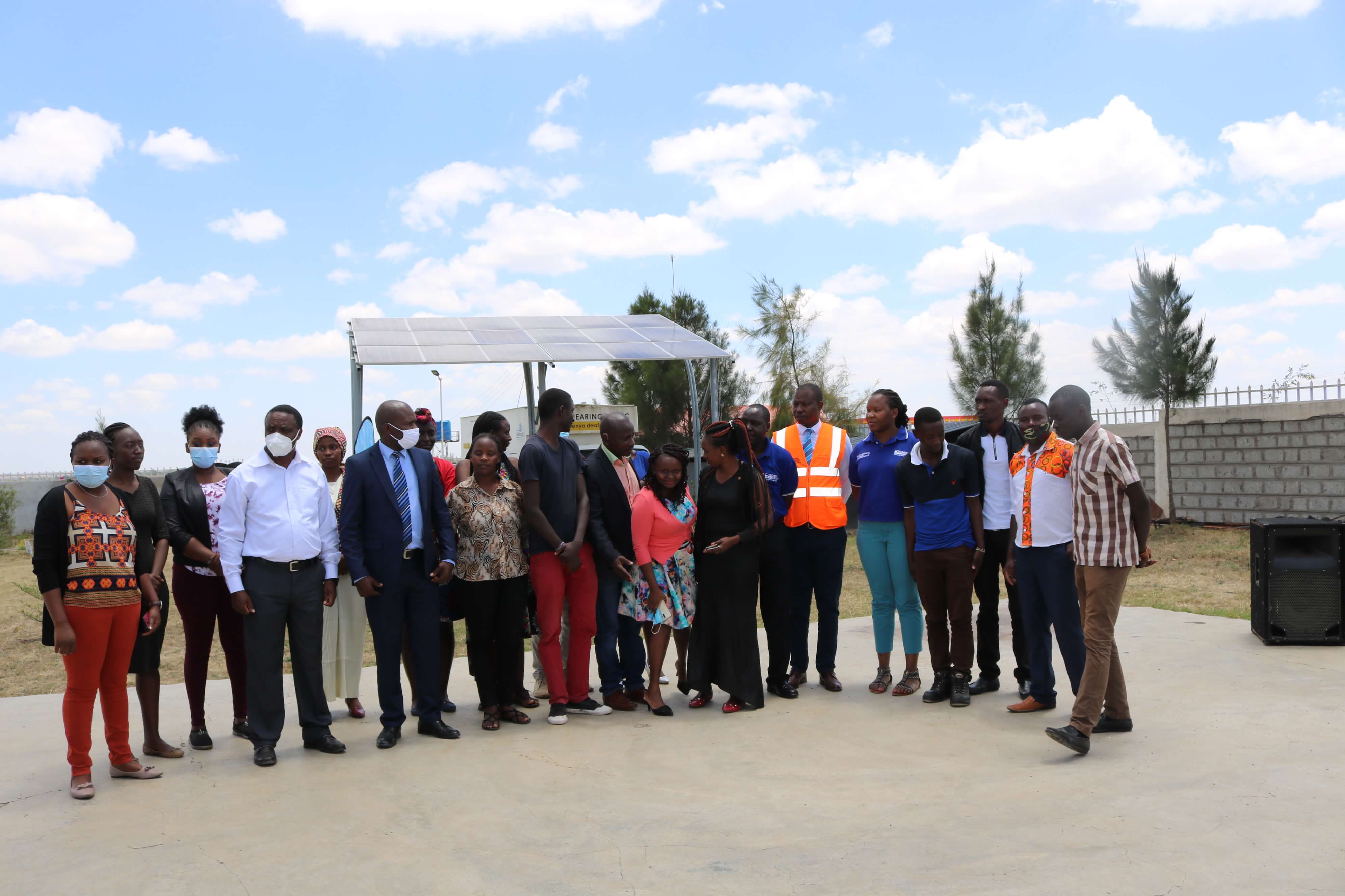 D&S staff pose with parents of Isinya School for the Deaf